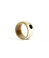 Broad bracelet in blond horn with black dots