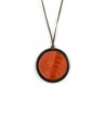 Black horn medallion pendant set with orange ostrich leather