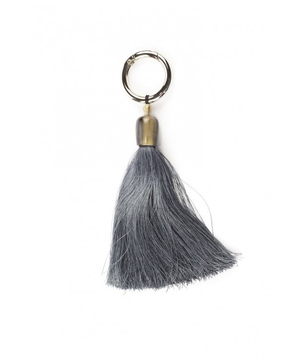 Tassel charm in horn and blue thread