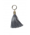 Tassel charm in horn and blue thread