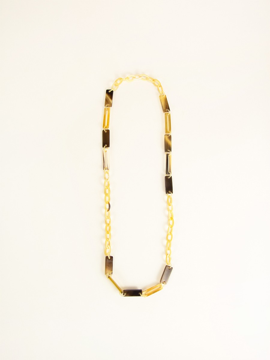 Long necklace with fine rings in various shapes made from clogs and blond African horn 2