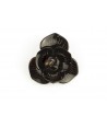 Flower brooch in plain black horn