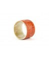 Broad ostrich leather wrapped bracelet - outer face in black horn and orange ostrich leather