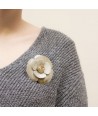 Double row camellia brooch in blond horn