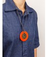 Checkered pendant circled with orange lacquer