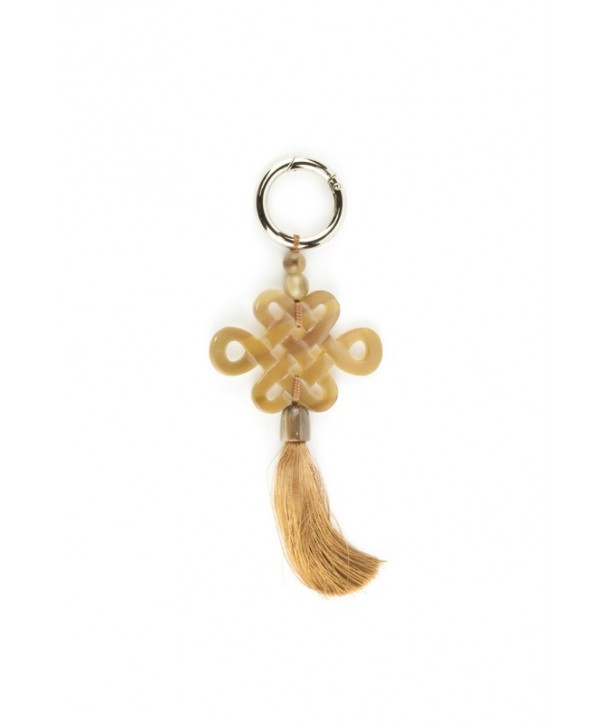 Tassel charm in horn and beige thread