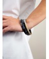 4 thin bracelets in black and white horn