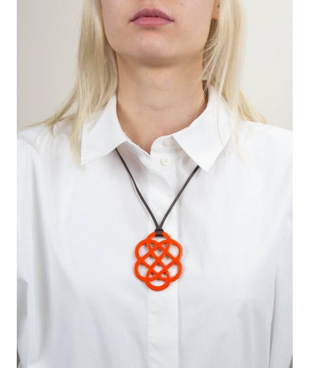 Orange lacquered flower pendant