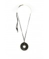 Round pendant in blond horn set with black ostrich leather