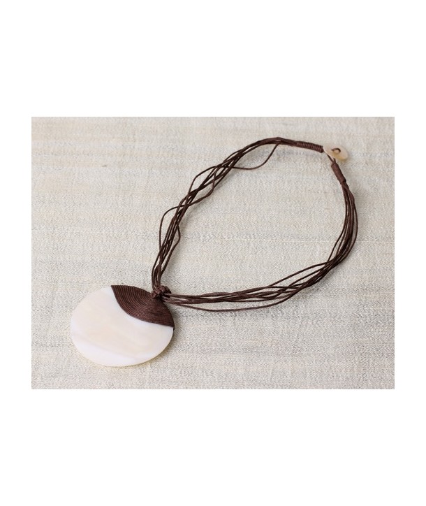 White mother of pearl round medallion pendant, brown cotton thread covering