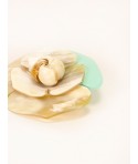 White horn flower brooch with a mint lacquer petal