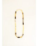 Long necklace with fine rings in various shapes made from clogs and blond African horn