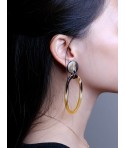 Oval earrings with African black horn stems