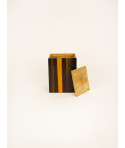 Square tea tin in striped black lacquer with natural stone lid